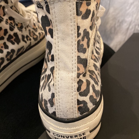 Thick sole with Leather converse appliqué on side. Few scuffs but in great shape
